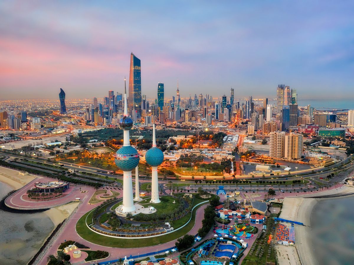 Illustration of Abu Dhabi skyline merging with blockchain nodes and stablecoin icons, symbolizing regulatory fusion for RWA stablecoin credit and SME finance in Abu Dhabi and UK